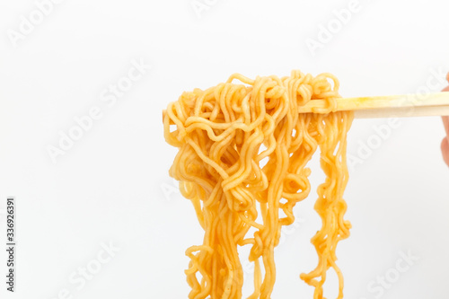 Instant cup ramen on white background
