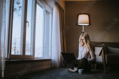 Young woman sitting on the ...
