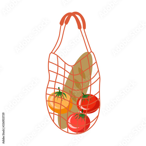 Eco knitted shopping bag. There are tomatoes and baguette in the bag.