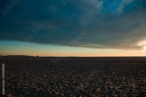sunset in the beach. Sand. Sky. Ocean.