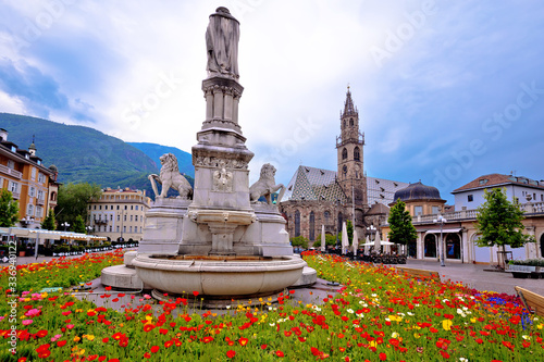 Bild auf Leinwand Bolzano main square Waltherplatz flowers and archiecture view