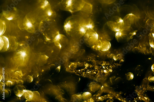 Golden bokeh. Glitter shiny sparkle background