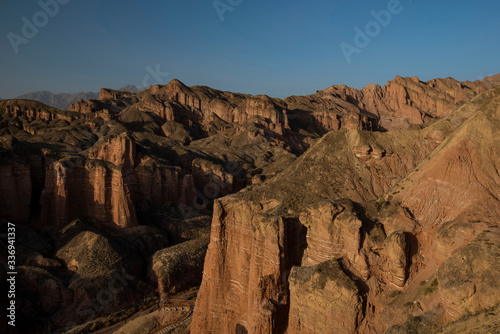 Binggou Danxia Landform National Park, beautiful rock formation in Zhangye, Gansu during sunset golden hour photo