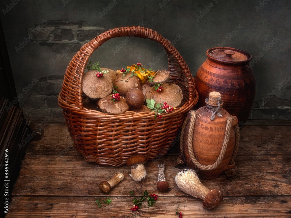 Still life with a basket of mushrooms on the floor Still life with a basket of mushrooms on the floor