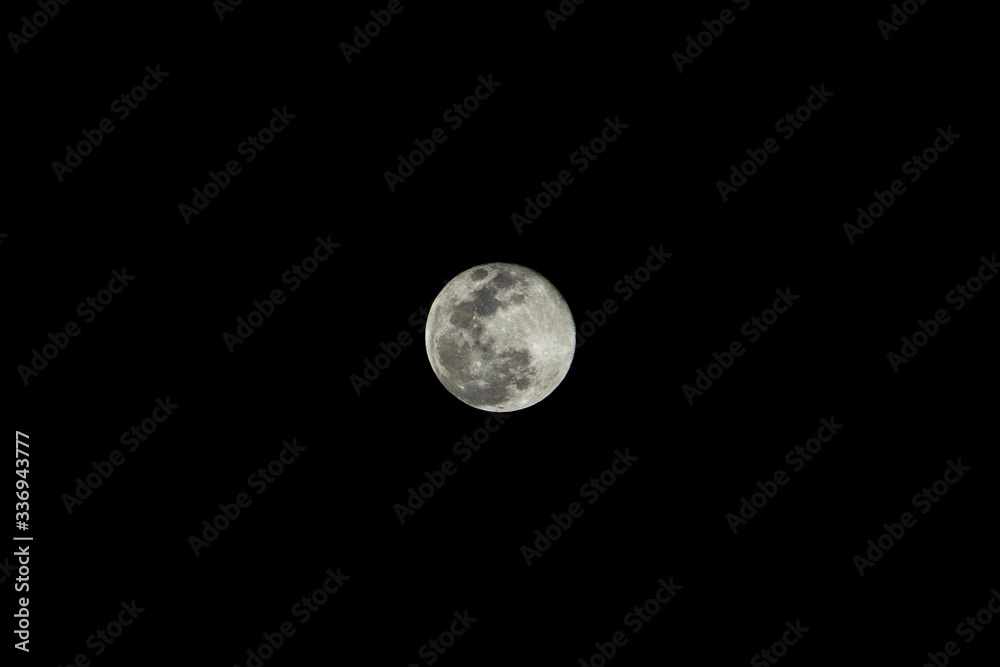 Closeup super moon isolated on black night background Closeup super moon isolated on black night background