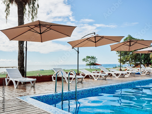 swimming pool in the tropical resort © SHOTPRIME STUDIO