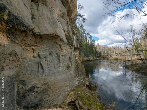 landscape with sandstone cliff on the river bank