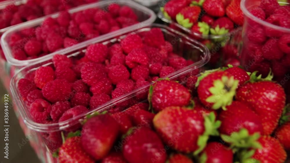 raspberries and strawberries on the market raspberries and strawberries on the market