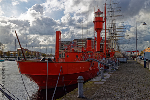 The Sandettie, a red painted old Lightship moored up at the Port of Dunkirk Nautical Museum in the central harbour.