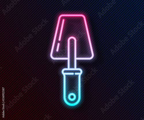 Glowing neon line Trowel icon isolated on black background. Vector Illustration
