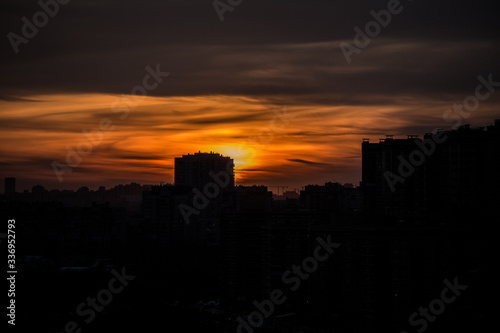 evening sunset over high-rise buildings © Андрей Атрощенко