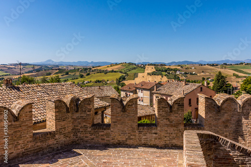 Obraz na płótnie Looking out to the surrounding countryside of Corinaldo, Le Marche, Italy, near Senigallia, on a beautiful sunny, summer morning w salonie