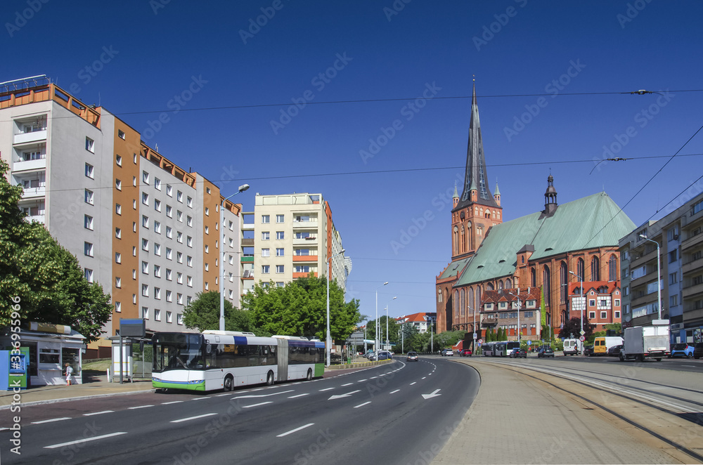 CITYSCAPE - Traffic in the city against the backdrop of buildings

