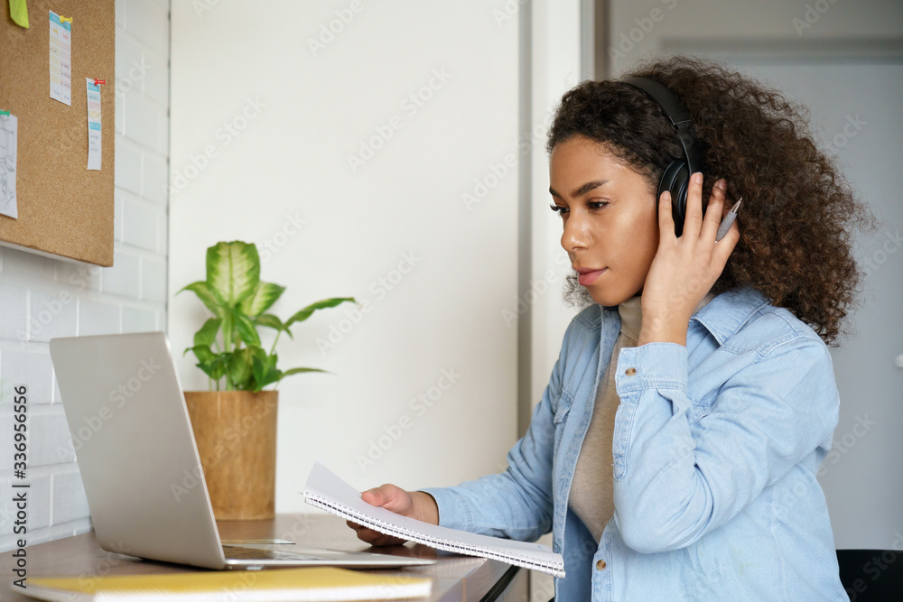 African teen girl college student, school pupil, remote worker learning ...