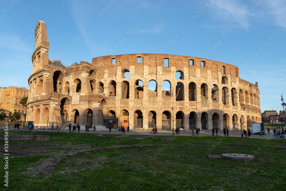 Exterior view of the Colosseum. Located in Rome, Colosseum is the main tourist attraction of the city.