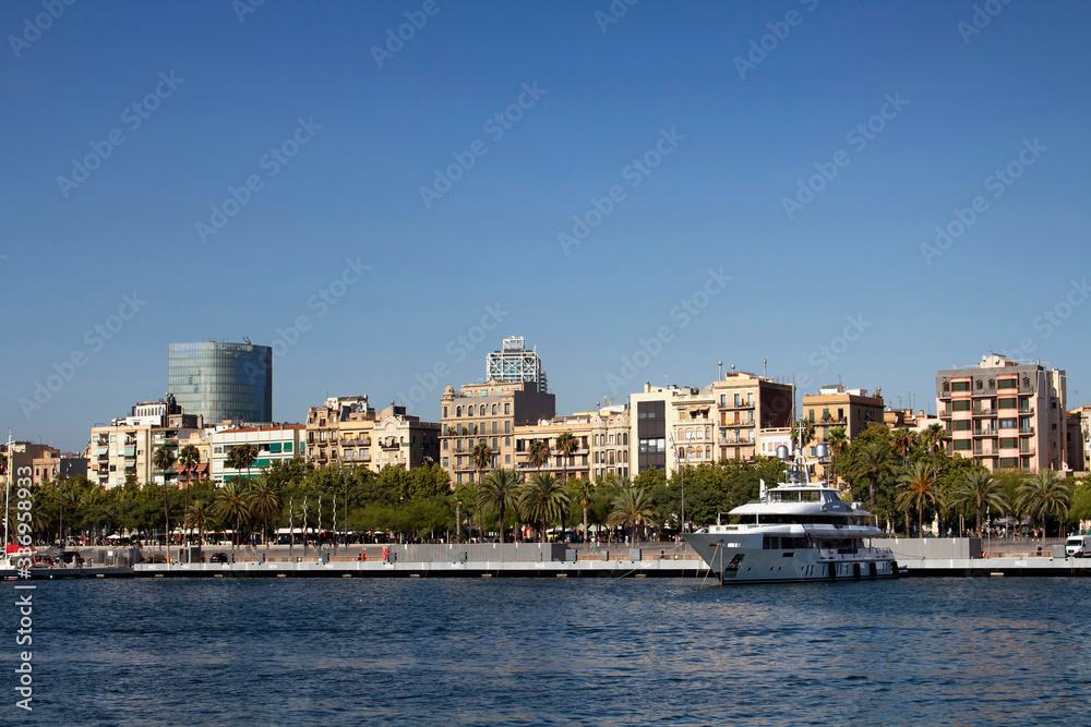 View of big, white luxury yacht at marina called 