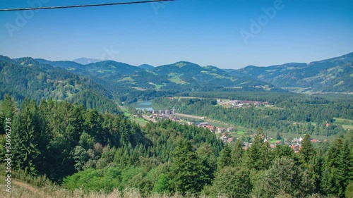 Panoramic Panning Shot Of Green Trees In Valley. Vuzenica, Slovenia. photo