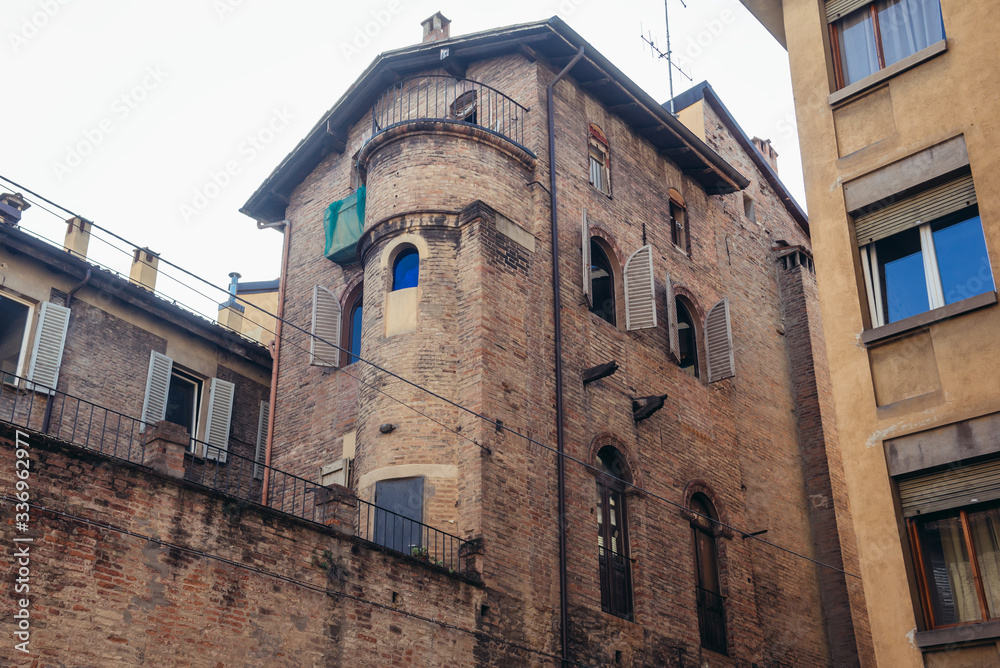 Old tenement house located in historic part of Bologna city, Italy