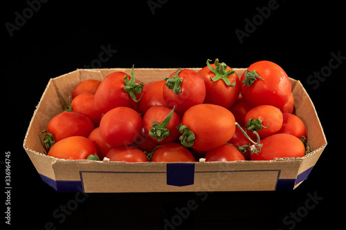 cherry tomato white background in the box