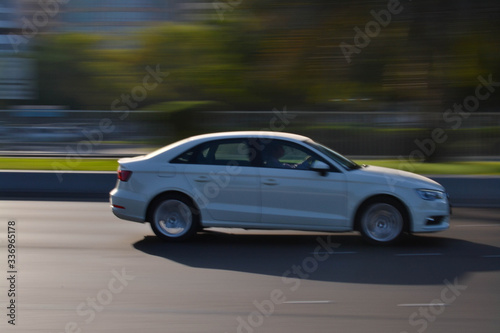 fast moving car, panning photography