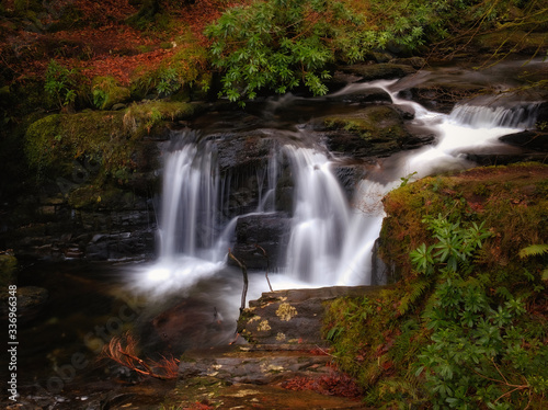 Long exposure shot of Torc creek with small waterfall in Kerry mountains  Ireland