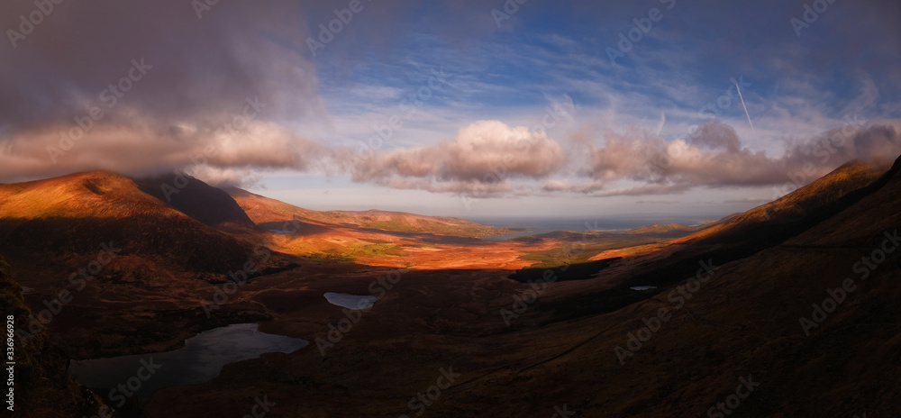 Spectacular view of Brandon Bay in sunset tones, taken from Conor Pass with a view on Atlantic Ocean, Dingle Peninsula, Ireland
