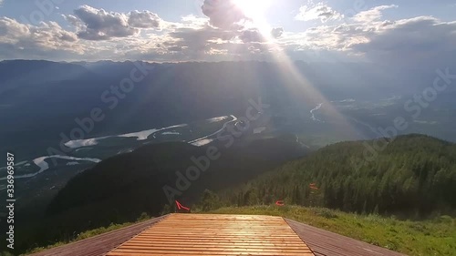 Wooden ramp leading off edge over valley near Golden in BC photo