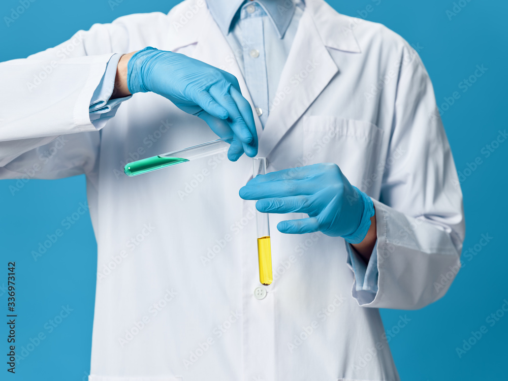 hand holding a test tube hand holding a test tube