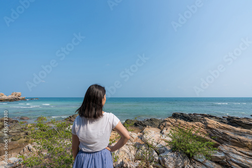 young cute hipster girl travelling at beautiful blue sky paradise tropical coast beach PP Island Krabi Phuket Thailand guiding idea for long weekend female relax rest woman women planning life