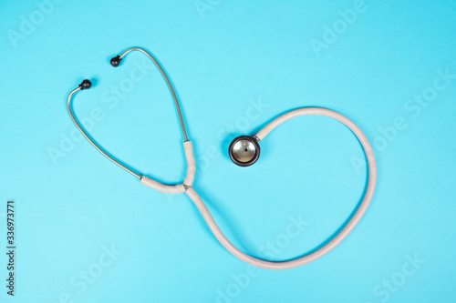 Stethoscope. Medical equipment. Healthcare and surgical concept. On a blue background