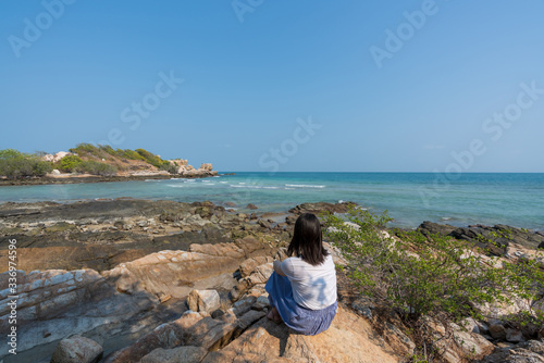 young cute hipster girl travelling at beautiful blue sky paradise tropical coast beach PP Island Krabi Phuket Thailand guiding idea for long weekend female relax rest woman women planning life