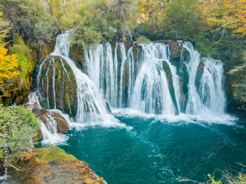 The Big Waterfall, known as the Milančev buk, is the largest and most beautiful part of Martin Brod on Una river in national park Una. photo