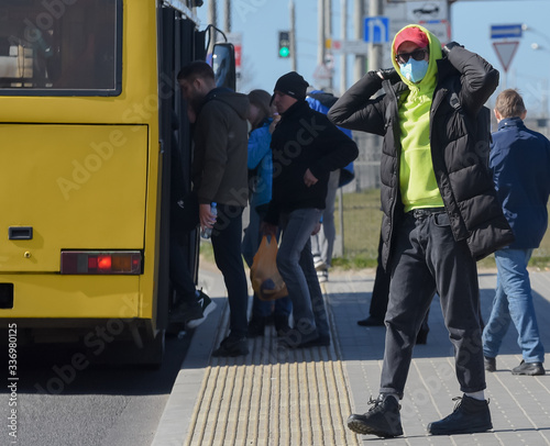 Man wearing facial hygienic mask outdoors. Virus protection ,Ecology, Air pollution, Environmental Awareness concept