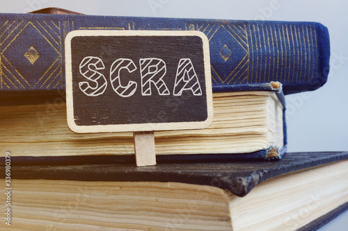 Writing note shows the text Servicemembers Civil Relief Act (SCRA) photo