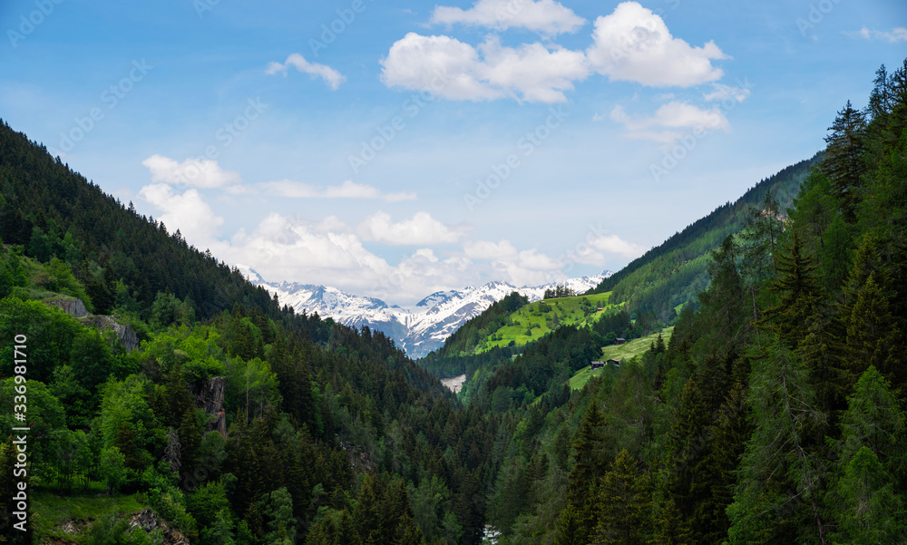 Panoramic view to the mountains. Snow covered Alps mountains on background. Switzerland, Europe.
