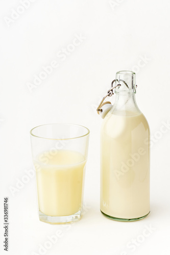 Dairy alternative. Rice milk in a high glass on white background.