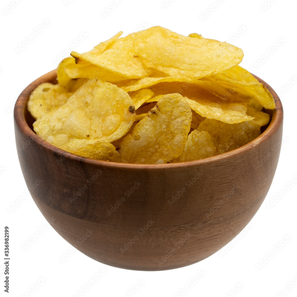 Potato chips in wooden bowl isolated on white background.