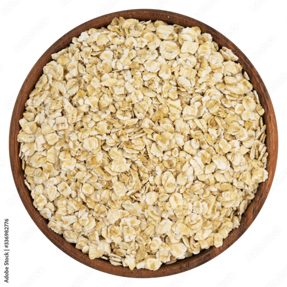 Oat rye flakes in bowl isolated on white background. Top view Oat rye flakes in bowl isolated on white background. Top view
