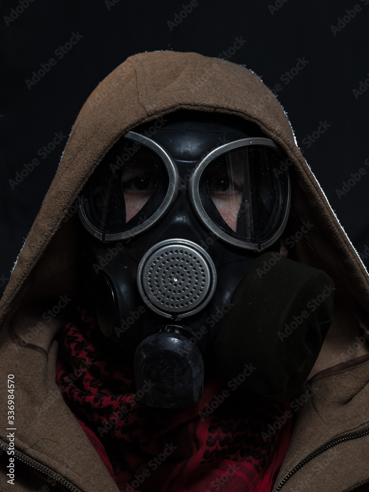 Man in a gas mask during a COVID-19 epidemic Man in a gas mask during a COVID-19 epidemic
