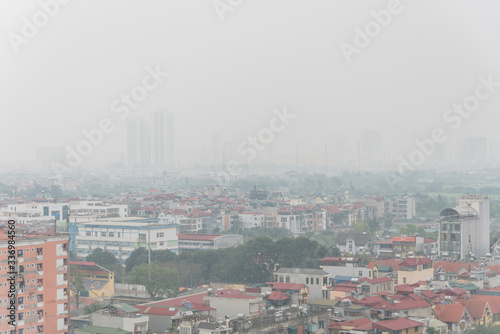 Top view foggy and misty Hanoi urban landscape causes by air pollution