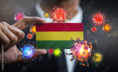 Corona Virus Around Bolivia Flag. Concept Pandemic Outbreak in Country