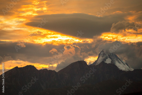 sunset in the mountains peak in switzerland summer