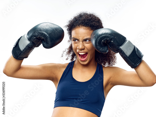 woman with boxing gloves © SHOTPRIME STUDIO