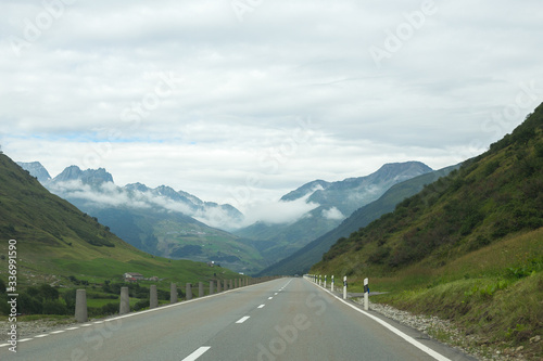 Asphalt road in Switzerland, road between the Alps mountains © vadimborkin
