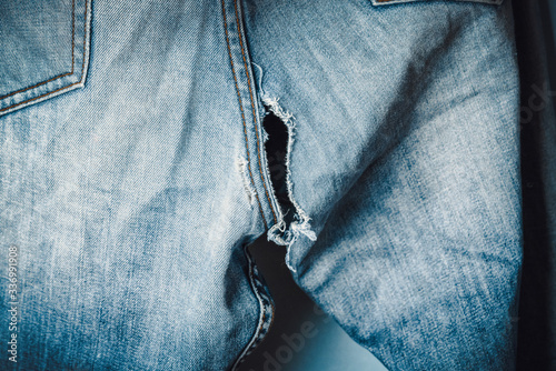 Fényképezés Jeans with a hole in the fanny