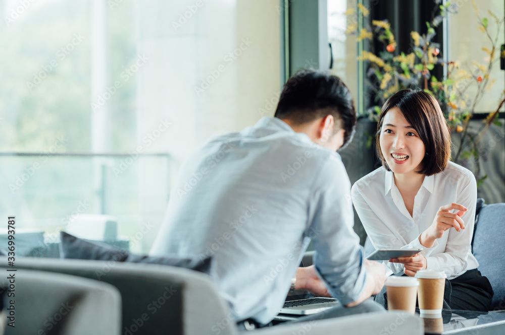 Young Asian business man and woman Stock Photo | Adobe Stock
