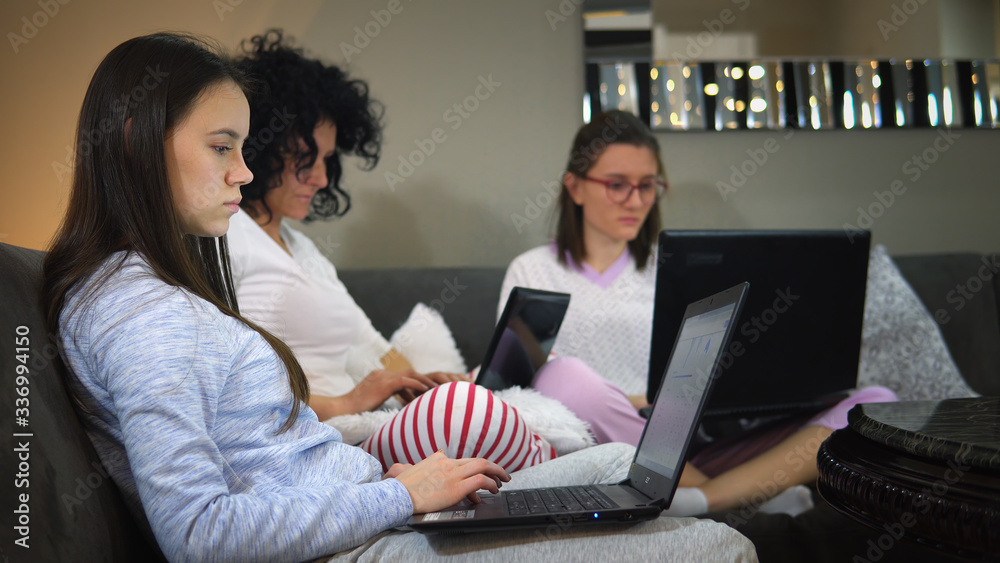 Happy family doing business together working at home on the laptop. Social distancing e-learning students Happy family doing business together working at home on the laptop. Social distancing e-learning students