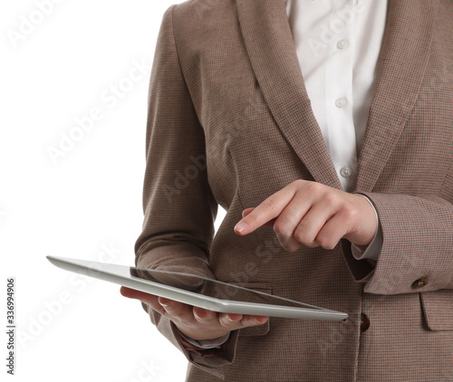 Young businesswoman with tablet on white background, closeup