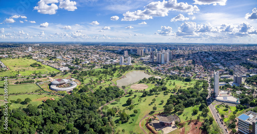 Panoramic aerial view of the city of Campo Grande MS, Brazil and the park of the indigenous nations. Big wooded city with a park, lake, green areas and low density buildings. photo