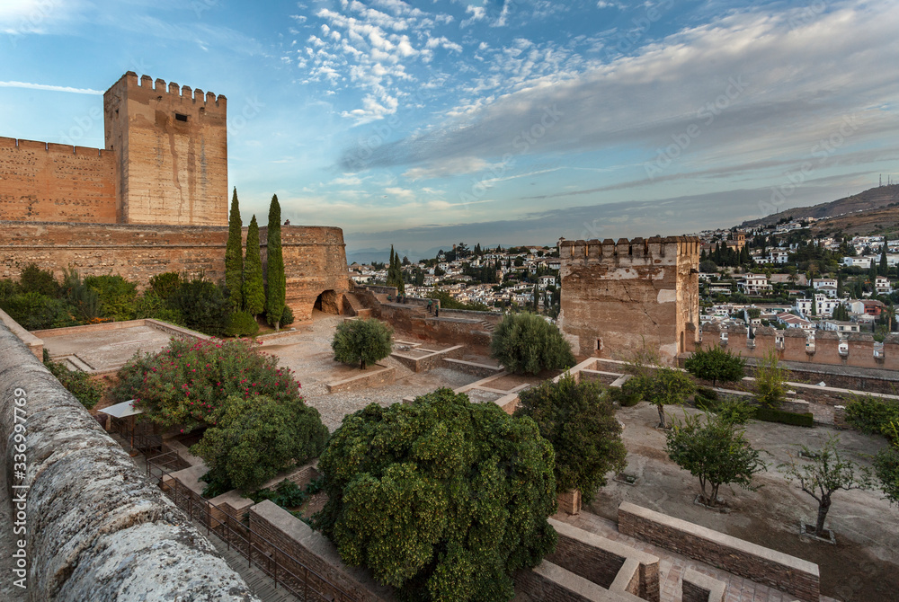 Garden and defensive structures in palace of Alhambra in Granada, Spain